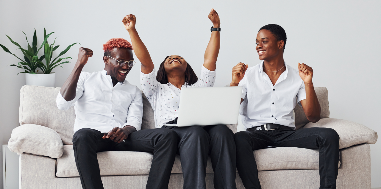 People sitted on a sofa